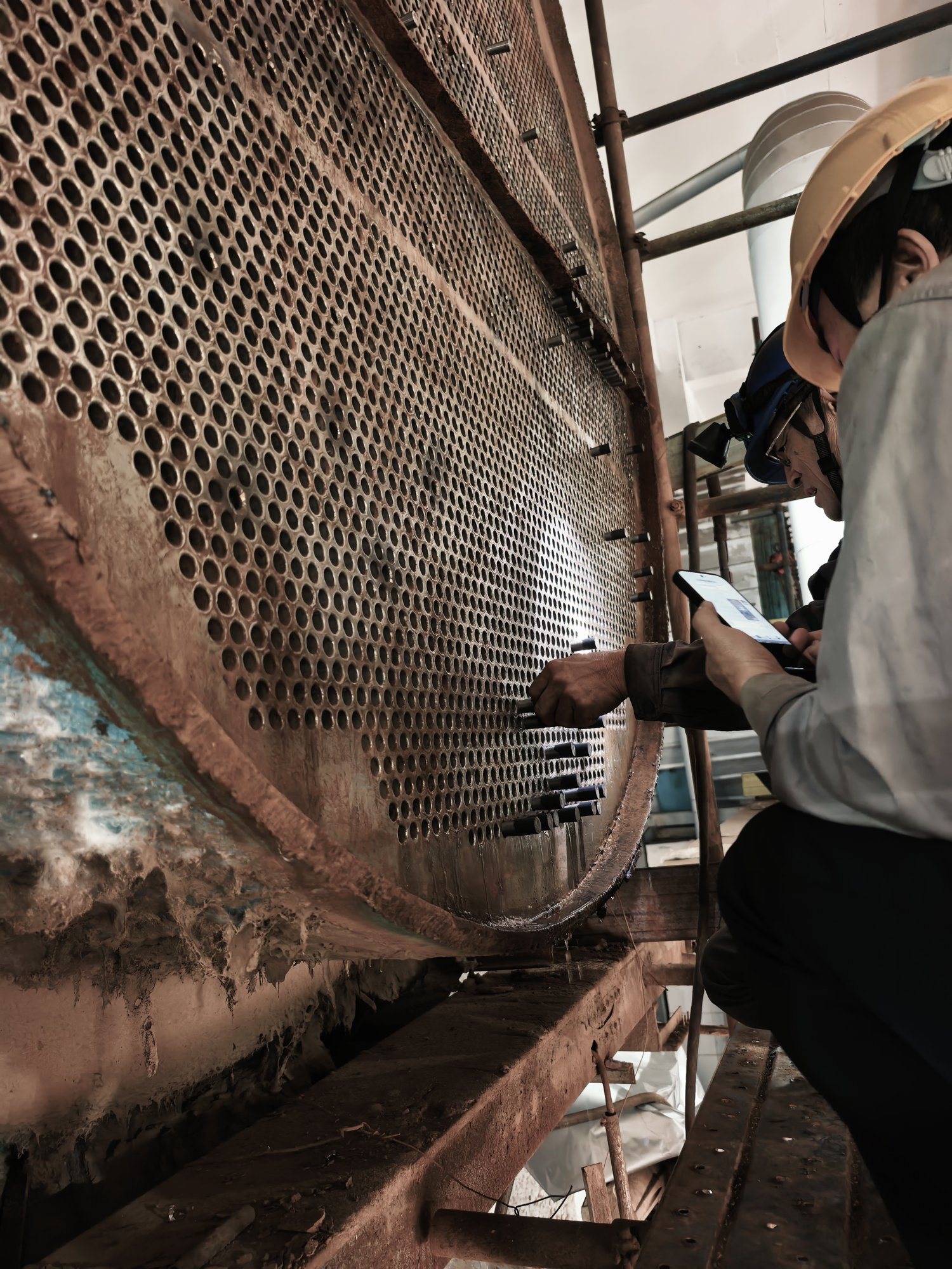 Retubing of high-pressure district-heating heaters, Shanxi Huaguang (2)